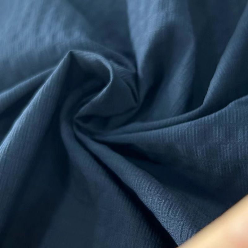 40D+20D*70D+40D+70D 100GSM Tissu en spandex de nylon recyclé 70D Réseau mousseux répulsif à l'eau