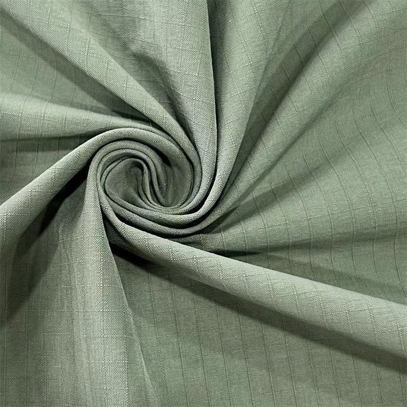 Tissu Taffeta à étirement à déformation à carreaux mat 70D+40D*160D+160D/2 Pour les vêtements extérieurs