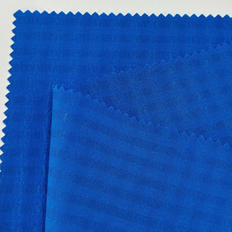 Tissu de polyester cationique semi-recyclé à quatre voies 200D+40D/200D*200D+40D/200D