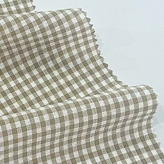 Tissus à grille à bulles de polyester cationique pour divers produits de vêtements