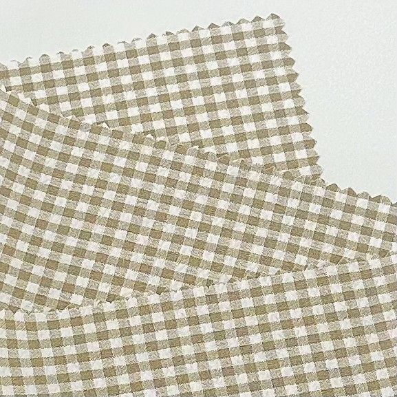 Tissus à grille à bulles de polyester cationique pour divers produits de vêtements
