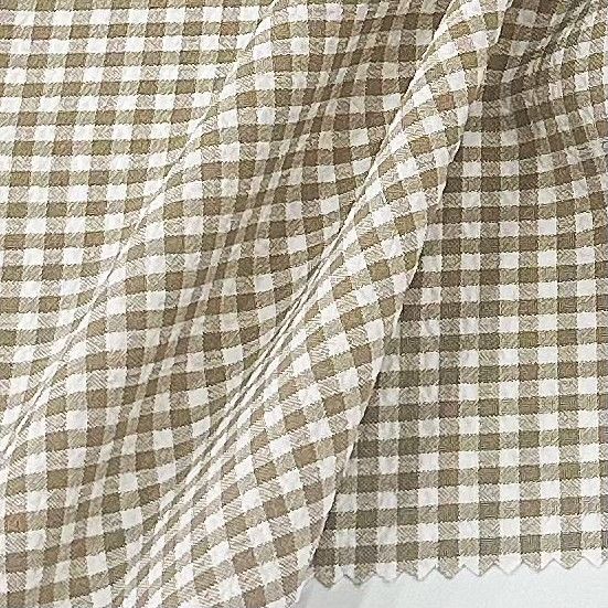 Tissus à grille à bulles de polyester cationique pour divers produits de vêtements