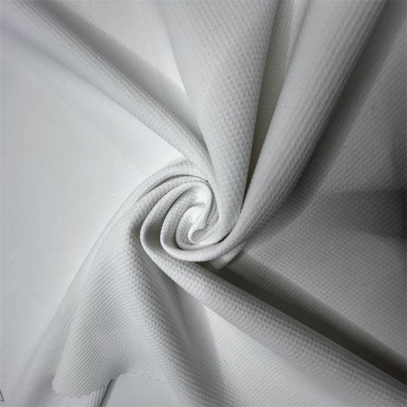 Tissu de polyester à quatre voies avec inclinaison variable 75D+40D*150D+40D 94% polyester recyclé 6% spandex